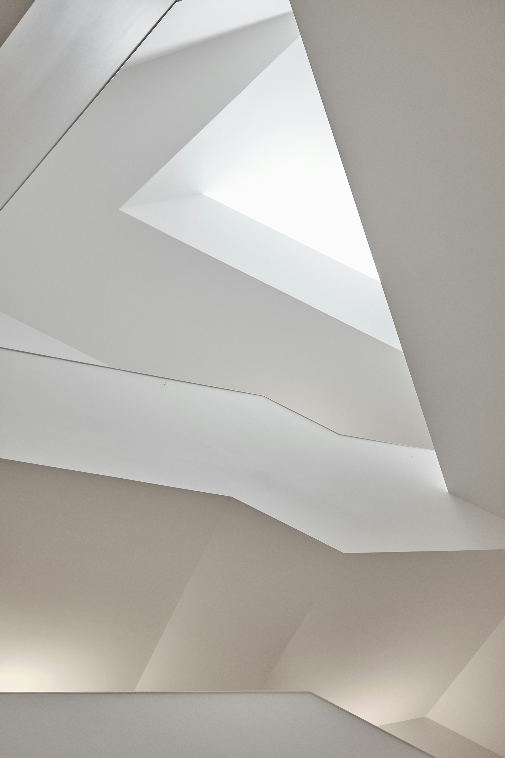 Skylit white architectural interior